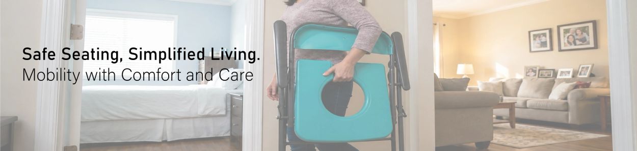 Person carrying a foldable turquoise chair indoors.
