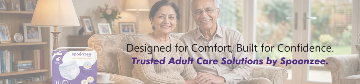 Happy elderly couple with Spoonzee adult diaper pants promoting comfort and confidence.