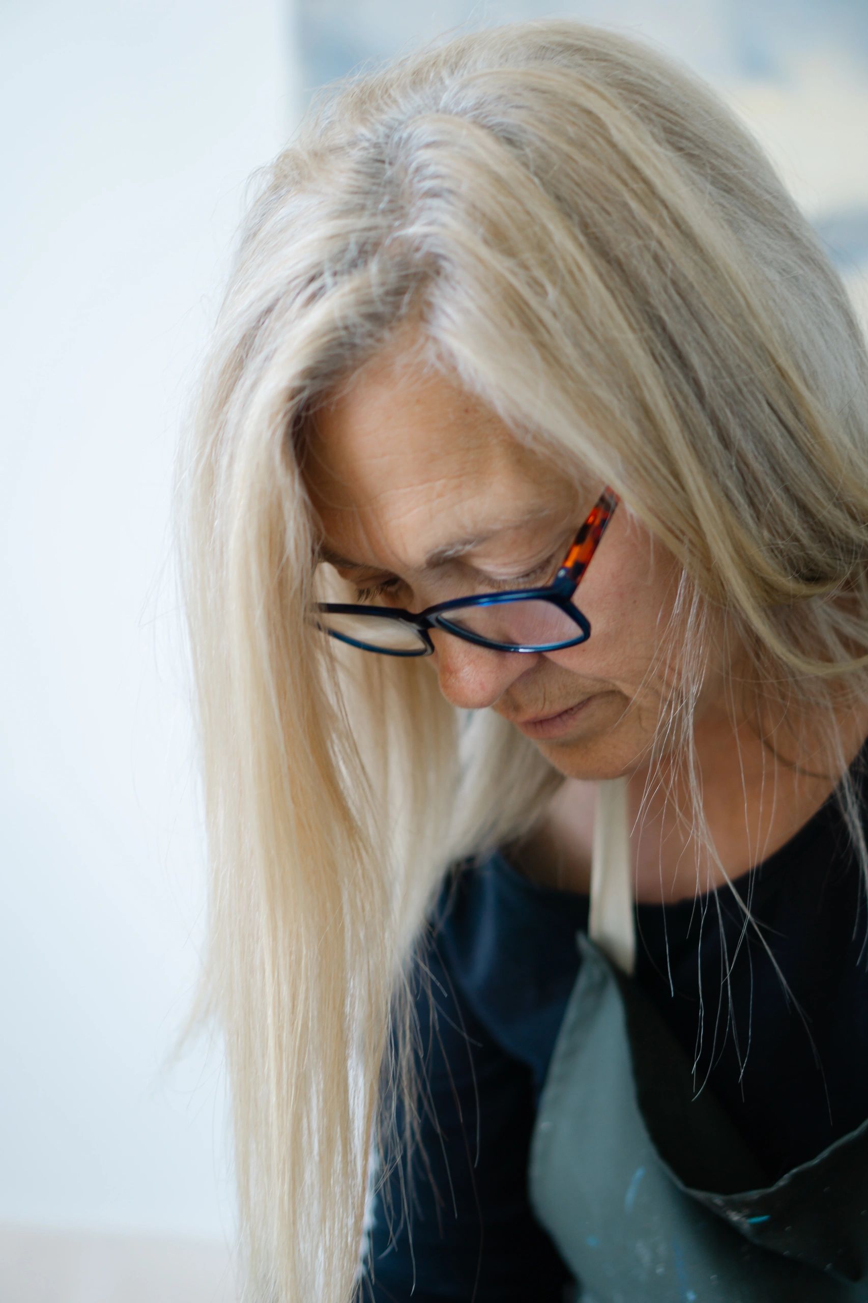 modern portrait of Devon artist in their studio by Felicity Billen