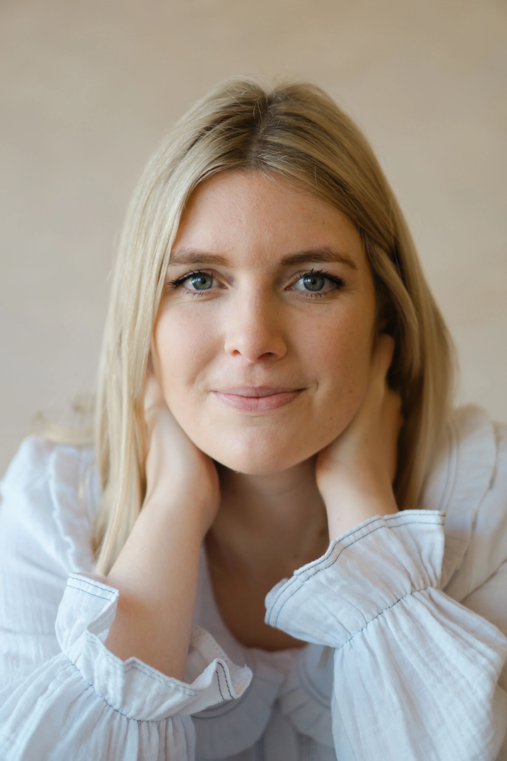 a smiling north devon artist during their professional portrait session 