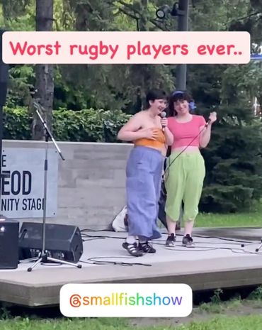 Two people on stage wearing colourful clothing. holding mics. Text reads 'worst rugby players ever. 