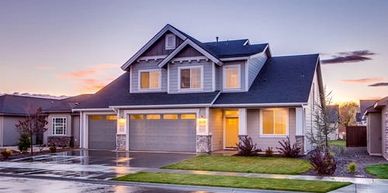 Residential home with sunset in the background