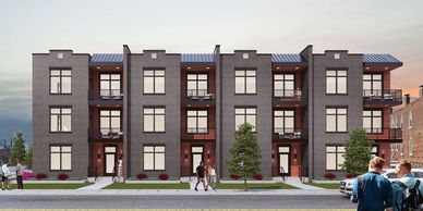 Modern three-story apartment building with balconies and large windows.