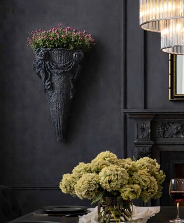 wall pocket in sultry dining room on either side of a fireplace