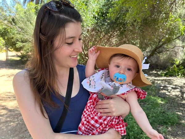 Photo of Krystin Christy holding her daughter, Talula.