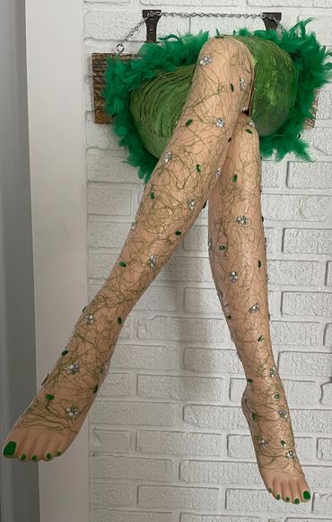 Mannequin legs created with vintage legs, a material that allows draping, beads, ribbon, silk thread