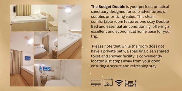 Compact, budget-friendly room with double bed, air conditioning, and shared bath nearby.