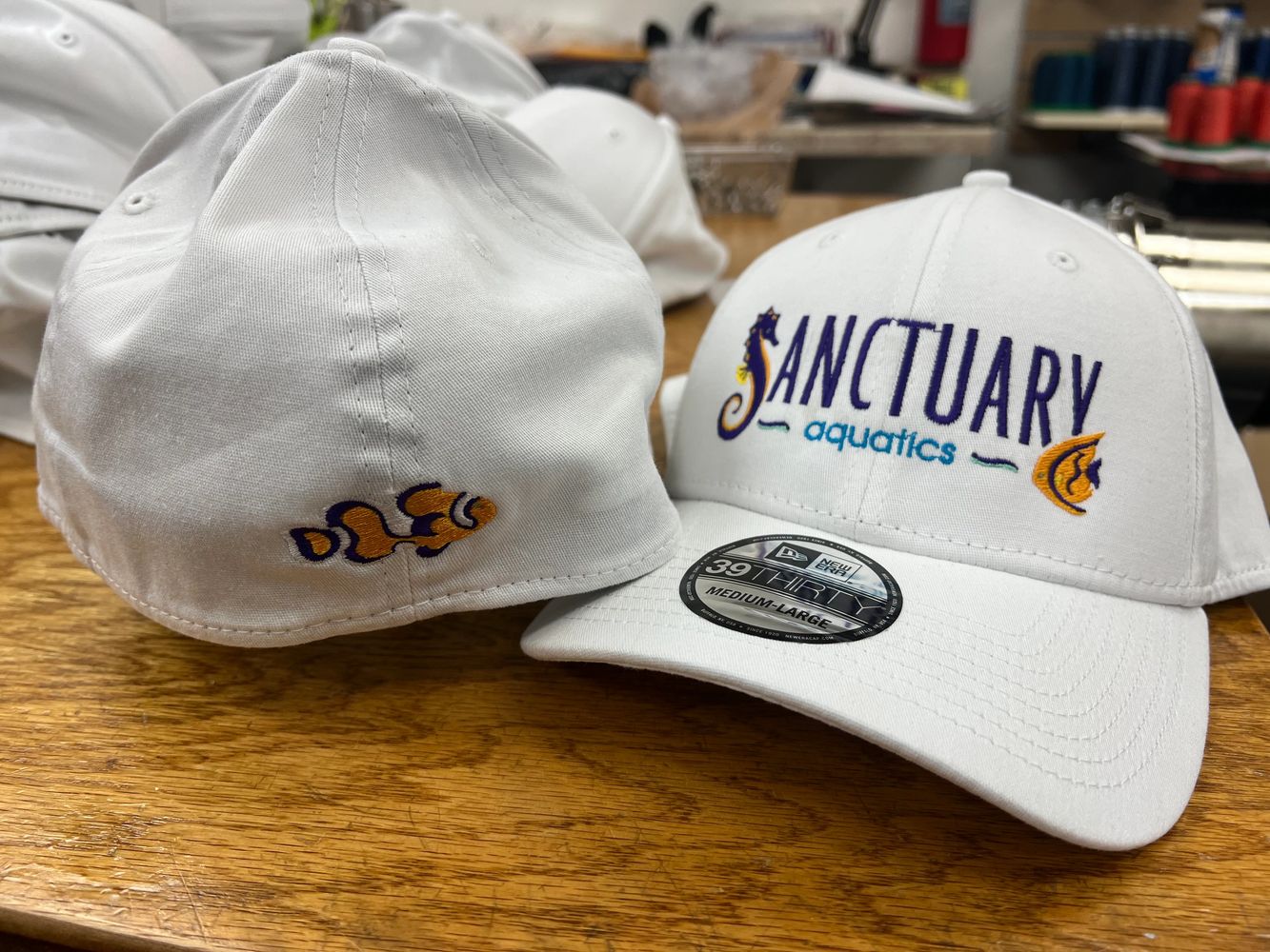 Sanctuary Aquatics Cap Embroidery