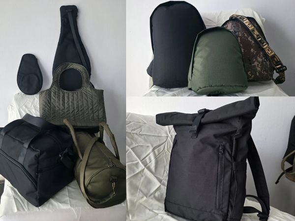 Various bags and padded covers displayed on a white surface.