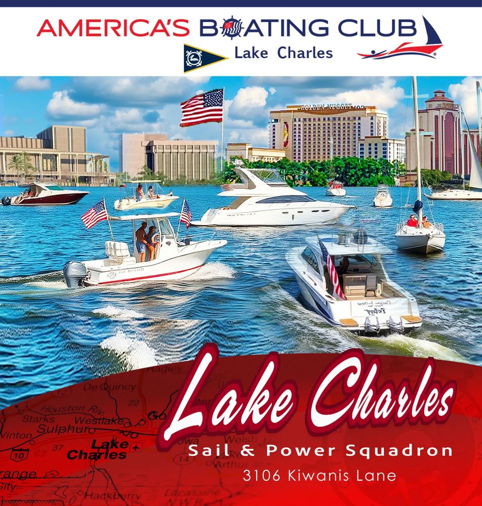 Boats sailing on Lake Charles with city skyline and American flags.