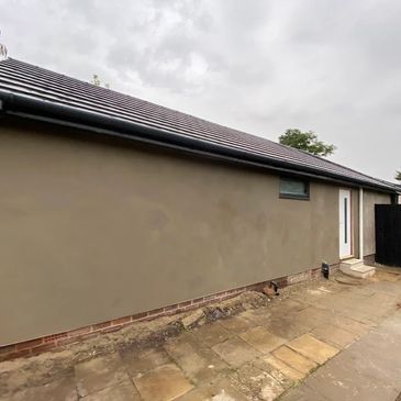 Rendered bungalow wall.
