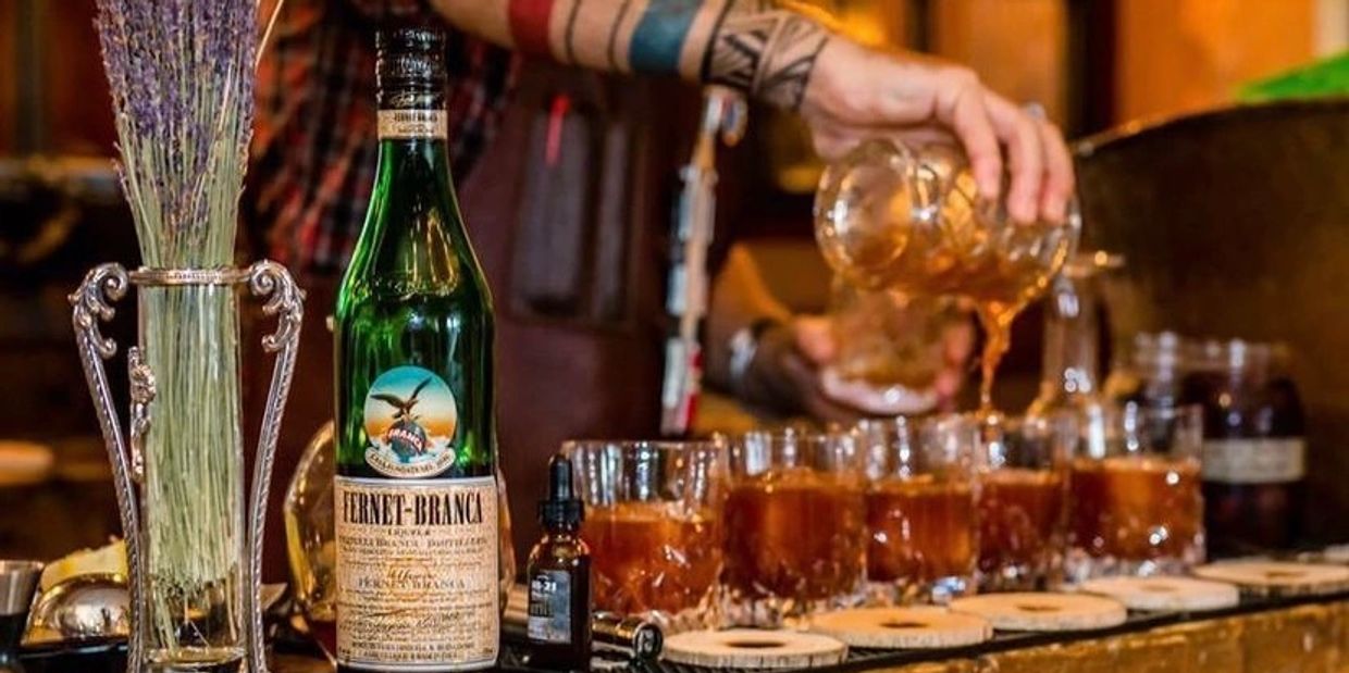 Serving crafted Cocktails at 215 Speakeasy Bar