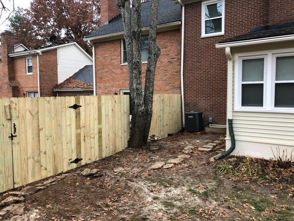 wooden privacy fence with a workaround in Lexington, Kentucky