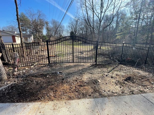 Black Aluminum Fence Install with a gate install for front yard security in Lexington, Ky