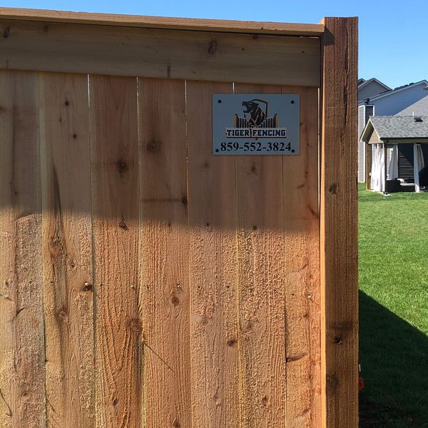 Shadow box fence made of cedar wood install in a residential area near Lexington, Ky