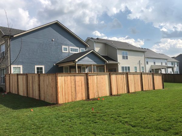 Cedar wood fence install with shadowbox style completed in Lexington, Kentucky