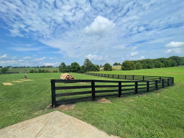 Farm fence painted and built to surround property. Install and painting completed near Lexington, Ky