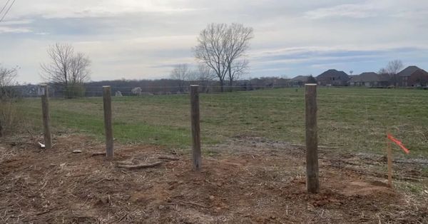 Post and wire fence installation for farm in Lexington, Kentucky