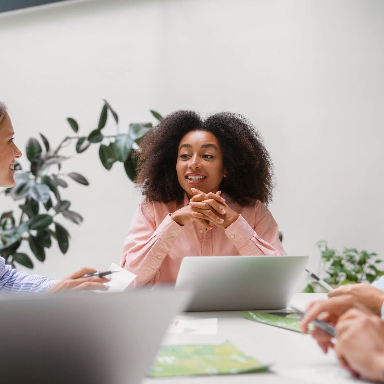 Young woman in a team meeting.