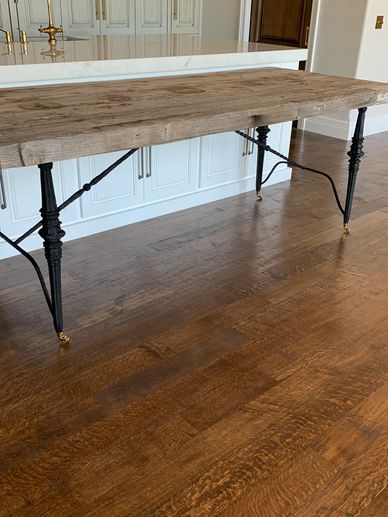 Wrought iron table bottom with wood top