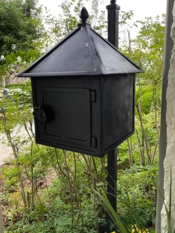 Wrought iron lamp style mailbox 