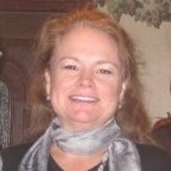 A woman smiling