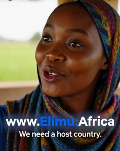 A woman wearing a colorful headscarf speaks about hosting a country for Elimu Africa.