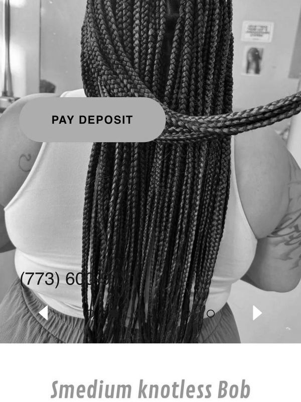 Medium knotless bob braids in brown and black on a person.