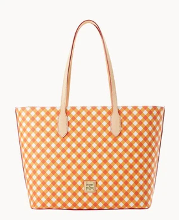 Orange and white checkered tote bag with leather handles.