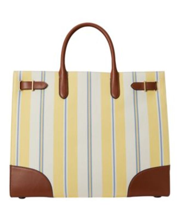 Striped tote bag with leather accents.