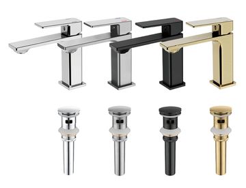 Four modern kitchen faucets in different finishes.