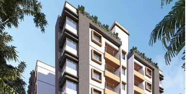 Modern mid-rise apartment building with balconies and greenery on the roof.