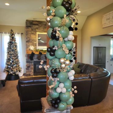 unique rustic Christmas themed display. light green, black and tan