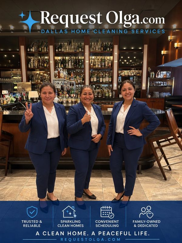 Three women in blue suits pose confidently in front of a bar for a Dallas home cleaning service ad.