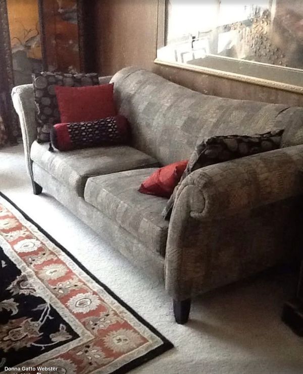 Refurbish couch to match rug and the room