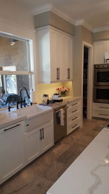 White kitchen with farmhouse sink