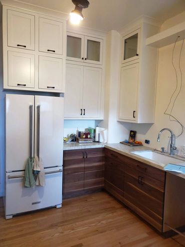 Two-tone kitchen with white uppers and wood lowers