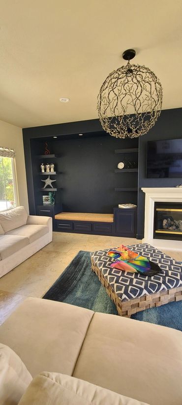 Navy built-in wall with bench seat in living room