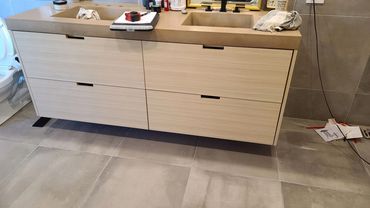 Light wood floating vanity with drawers