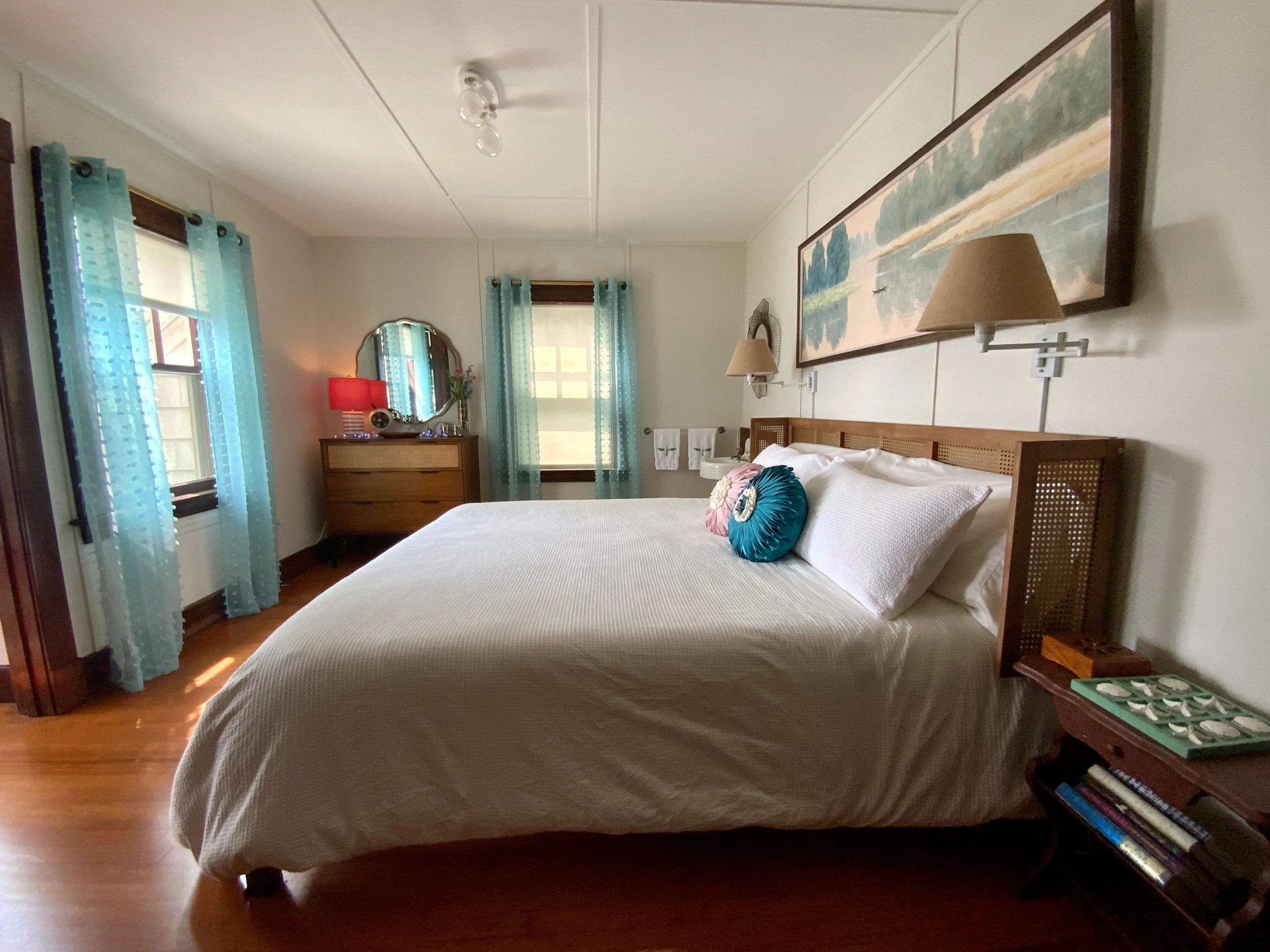 Our newly redesigned primary bedroom has a king sized bed