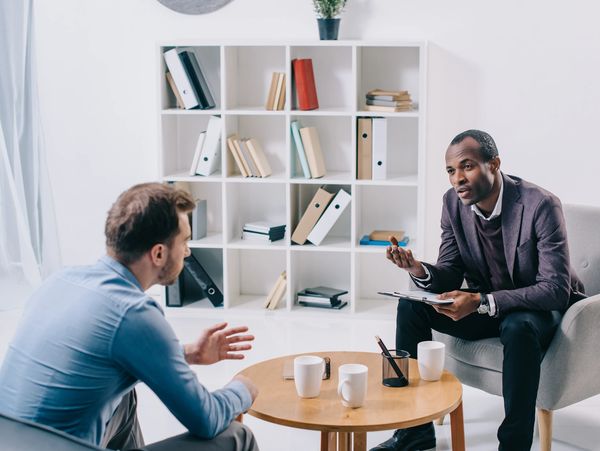A therapist having a session with a patient