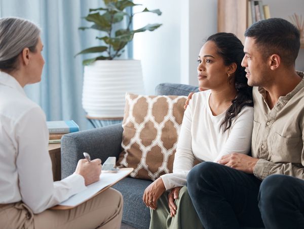 A counsellor having a session with a couple