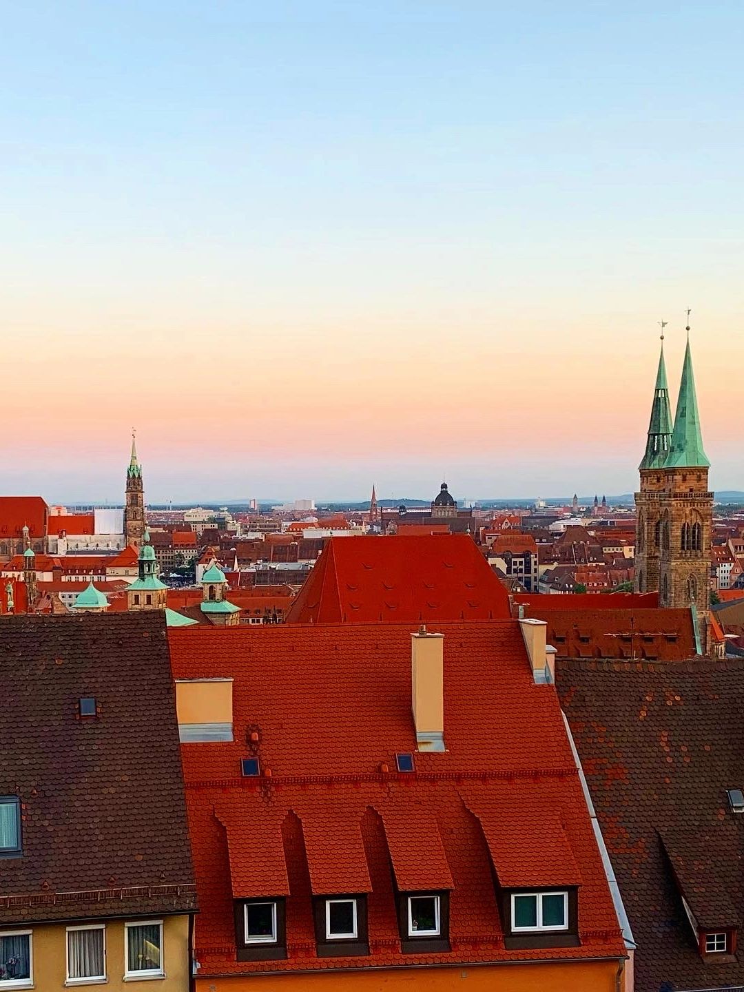 Nuremberg, Germany at sunset – with red rooftops and a pink sky