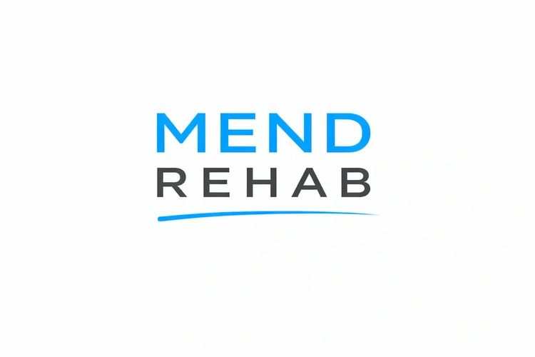 Logo for Mend Rehab with blue and black text and a blue underline.