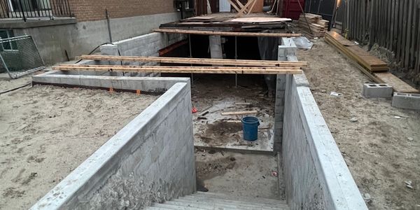 Concrete foundation and stair construction site.