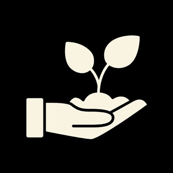 Mano sosteniendo una planta en crecimiento.
