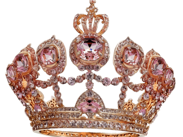A golden crown adorned with pink gemstones and intricate details.