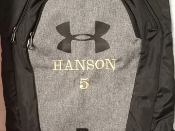 Backpacks, bags, golf bags, totes ect. We can personalize with a logo or name. Price depends on desi