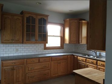 Stratford Kitchen remodel/renovation, custom oak cabinets with granite and butcher block countertops