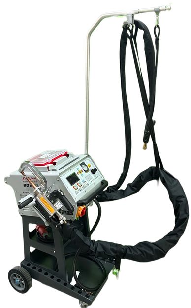 Industrial welding machine with control panel and cables.